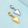 Polished gold and silver heart pendants with lobster clasps on a blue background - Heart Style 1 / Steel