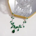 Close-up of silver necklace with green pear-cut gemstones and marquise crystals - Necklace-Green
