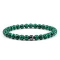 Macro detail of natural malachite beaded bracelet with a grey hematite octagon stone - 6 mm / Green Peacock Stone