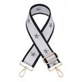 Close-up of adjustable wide strap with black star patterns and gold metal swivel hooks - Silver