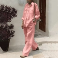 Women's pink linen two-piece set featuring a long sleeve shirt and wide-leg pants - S / Pink