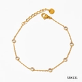 Bracelet doré en acier titane orné de zircons ronds colorés et d'un fermoir mousqueton - Bracelet Or Zirconia Blanc (SBK131)