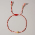 Handmade red and white woven bracelet with a gold cross pendant and adjustable tassel - Red White Sporty Cross