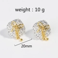 Detail view of square textured silver earrings with gold bow and hanging beads - Silver