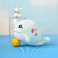 Detailed macro view of a cute mint green narwhal plush toy with soft embroidered eyes - 12cm / Mint Green