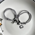 Matching magnetic astronaut couple bracelets in grey woven rope and silver charms - Grey - Silver Heart Magnet