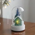 Christmas glass dome night light with blue tree and wooden house on a white base - Green House