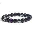 Bracelet en perles d'hématite noire métallique et œil de tigre violet sur fond blanc - 10mm Œil de Tigre Violet