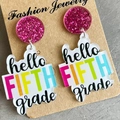 Detail view of Fifth Grade teacher earrings in pink glitter and acrylic on jewelry card - 5th Grade (Hello Fifth Grade)