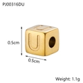 Macro view of a 0.5cm golden titanium steel cube bead featuring an embossed letter U - Letter U / Gold