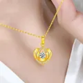 Detail shot of heart-shaped gold-plated pendant necklace with white crystals on a model - Pendant Only / Lucky Heart Zirconia Pendant
