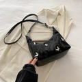 Black pleated underarm bag with silver butterfly charms and adjustable strap - Black