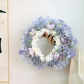 Detailed view of handmade lavender and blue floral wreath for traditional hair styling - First Sight Purple (Material Kit)