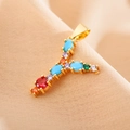 Macro shot of gold letter Y pendant inlaid with colorful cubic zirconia and vibrant gems - Letter Y