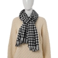 Classic black and white houndstooth cashmere scarf with tassel fringe on a white mannequin - Large Houndstooth Black White