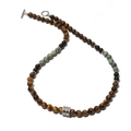 Detail of 8mm map stone and obsidian beaded necklace with a silver T-bar toggle clasp - 8mm Bead / Tiger Eye & African Pine