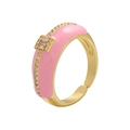 Detailed macro view of pink enamel coating and sparkling cubic zirconia stones on ring - Pink T-Square Row Zircon Style