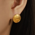 Elegant gold titanium steel stud earrings with chic round water ripple texture for women - Gold