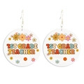 Close-up of circular wooden earrings featuring 1st Grade Teacher text and floral motifs - 1st Grade Teacher (Hook)