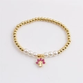 Détail du bracelet perlé avec billes dorées, perles et pendentif arbre rose - CB0587 Arbre Perle