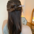 Silver hair pin with purple flower and pearl tassels shown in an elegant hairstyle - Gold Purple Flower Pearl Tassel Style (90#)