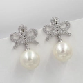 Elegant silver bow earrings with sparkling cubic zirconia and white high-luster pearls - Silver Bowknot Pearl Drop Earrings