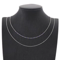 Detailed view of silver double-layered chain necklace with delicate purple beads on neck model - Purple