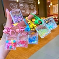 Porte-clés bouteille de sable mouvant Mickey lumineux avec perles colorées en rose et bleu - Style Fermoir Mousqueton / Style de livre lumineux (Mélange aléatoire)