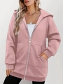 Detail of pink zip-up hoodie featuring a drawstring hood and large front pockets - S / Pink