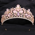 Detailed macro of golden bridal crown with pink crystals and floral alloy patterns - H1370 KC Gold + Pink Opal