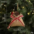 Pochette de Noël en toile de jute avec pommes de pin, baies et nœud en ruban rayé - Toile de Jute Naturelle Café Avec Ruban