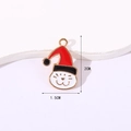 Christmas cat alloy enamel charm with dimensions 2cm by 1.5cm for DIY bracelets - Cat in Christmas Hat