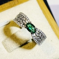 Elegant emerald green gemstone ring with hollow wheat ear design and white zircons - US 9 / White Gold