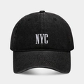 Close-up of NYC white embroidery detail on black washed denim baseball cap texture - Adjustable / Black