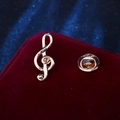 Classic gold treble clef musical note brooch pin with butterfly clasp on red velvet - Gold Musical Note