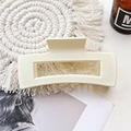Detail of cream rectangular matte hair claw clip on woven coaster in lifestyle setting - Large Matte Square Claw-Cream White
