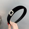 Close-up of black velvet headband featuring sparkling square zircon crystal accents - Clover (Square) Rhinestone Style