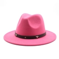 Macro view of bright fuchsia wool felt fedora featuring star studded leather band - Rose Red