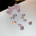 Elegant purple flower tassel earrings with shimmering crystal drops on a white tray - 16# Purple