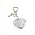 Portachiavi con specchio pieghevole a cuore in argento con ciondolo a fiocco - Portachiavi Specchio Cuore Argento