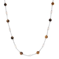 925 silver tiger eye necklace with white pearls displayed in a U-shaped drape - 925 Silver / Tiger Eye Round Bead Necklace - White Gold Color