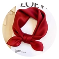 Elegant solid red silk scarf tied in a knot, displayed on a stylish beige shirt collar - Burgundy