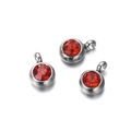 Detailed close-up of three silver pendants with red faceted zircon stones and hanging loops - 10 Pieces per Pack / Steel Border Red Stone