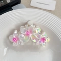 Frangipani hair claw with iridescent pink gradient flowers for elegant ponytails - Triple Flower Purple Green
