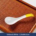 Japanese ceramic soup spoon in yellow and white finish with 16cm length and hanging hole - Yellow/White