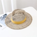 Handwoven seagrass sun hat with yellow ribbon detail on a clean white surface - M / Yellow