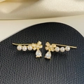Elegant gold bow crawler earrings with white pearls and sparkling teardrop zircon stones - 14K Gold