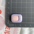 Detailed view of a mini purple resin retro TV charm on a scale showing 1.8cm size - Microwave/Purple TV