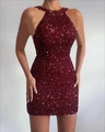 Close-up detail of burgundy sequins on a halter neck mini dress with light reflections - S / Dresses / Burgundy
