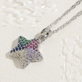 Macro detail of star pendant necklace with colorful micro-pave zircons on silver chain - Colorful Zirconia (XL2593-2)